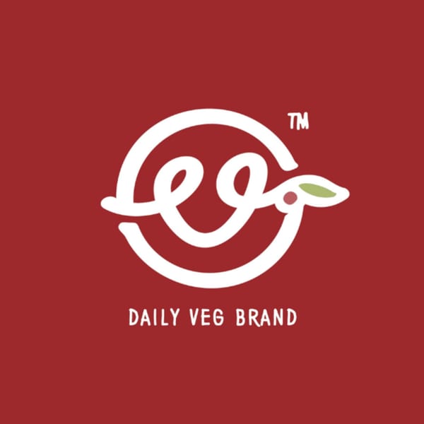Daily Veg brand logo, a white stylized "veg" with a leaf and berry on a red background.