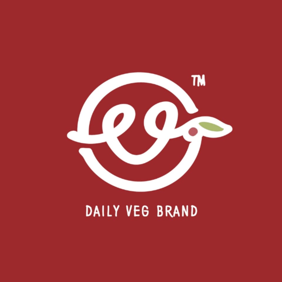 Daily Veg brand logo, a white stylized "veg" with a leaf and berry on a red background.